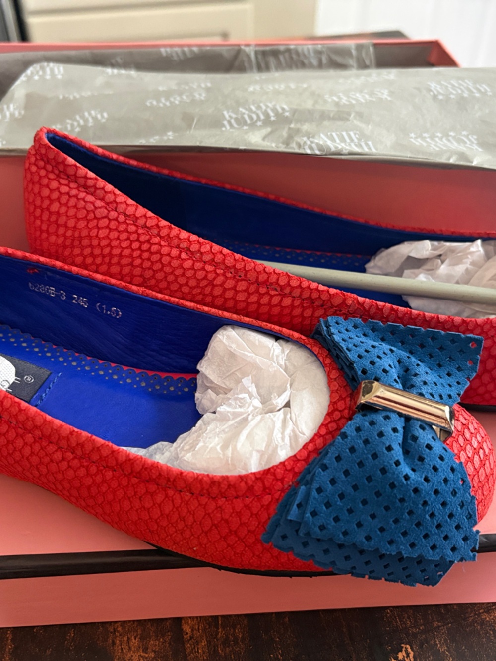Women’s Red Textured Ballet Flats with Blue Bow Accent
